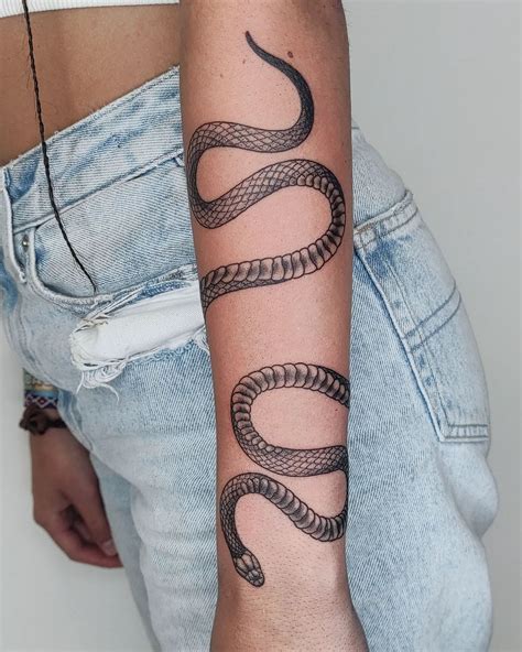 gucci snake tattoo on finger|snake wrap around arm tattoo.